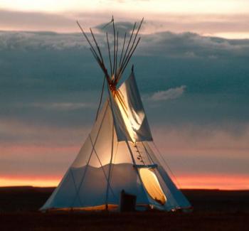 inside the teepee at night, the light glows